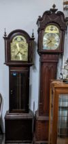 Two 20th century mahogany cased longcase clocks, the ornate Gothic style case with West German