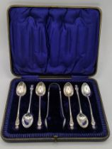 A set of six silver teaspoons and a pair of sugar tongs by Joseph Rodgers and Sons, hallmarked