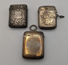 Three silver vesta cases to include one engraved with floral decoration, total weight 44.9g