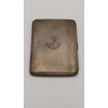 A silver machine turned cigarette case having engraved detail on the front hallmarked Birmingham