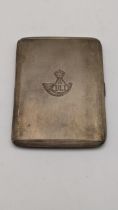 A silver machine turned cigarette case having engraved detail on the front hallmarked Birmingham