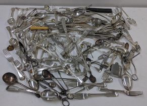 A selection of Victorian and later silver plated cutlery to include a serving ladle and various