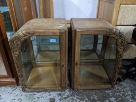 A Pair of walnut carved table top display cabinets, carved decoration to one side of glazed door,