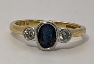 A sapphire and diamond 18ct gold ring 3.5g Location: