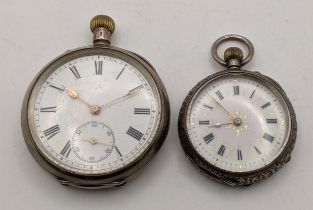 A pair of keyless open faced silver case pocket watches with white enamel faces and Roman dials,