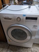 A Bosch Serie 4 Eco silence Drive washing machine Location: