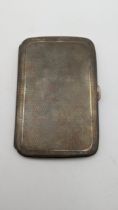 A silver machine turned cigarette case 13cmH 9cmW hallmarked Chester 1926, 185.4g Location: