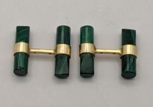 A pair of malachite and silver gilt baton cufflinks Location: