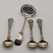 A 19th century silver sifter spoon and three salt spoons, total weight 107.1g Location: