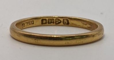 A 22ct gold wedding band, size M, 2.8g Location: