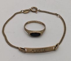 A 9ct gold bracelet together with a yellow metal ring inset with black onyx, total weight 3.4g