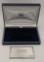 A silver Mappin & Webb card case having an engine turned front, hallmarked Birmingham 2012, 58.9g,