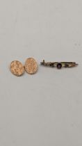 Gold to include a cufflink stamped 10ct, 4g and a Victorian brooch with seed pearls and steel bar,