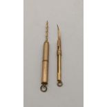 Two 9ct gold retractable, toothpicks, 7.6g Location: