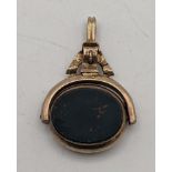 A 10ct gold Carnelian and bloodstone swivel Fob 6.5g Location: