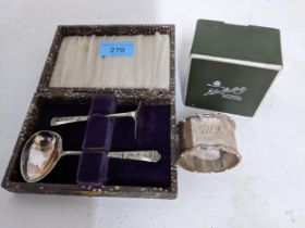 A cased silver child's pusher and spoon, Birmingham 1947, marks for Hampton Utilities napkin ring