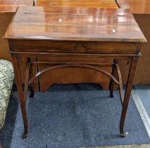 A reproduction writing desk table having a hinged top opening to reveal a fitted interior 80cm h x