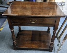 A reproduction oak side table having an inset drawer and shelf below 60cm h x 61.5cm w Location: