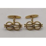 A pair of 18ct gold and diamond cuff links 7.1g Location: