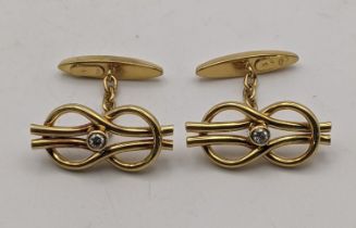 A pair of 18ct gold and diamond cuff links 7.1g Location: