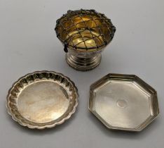 Two silver pin dishes to include an octagonal dish having a machine turned design and one other,