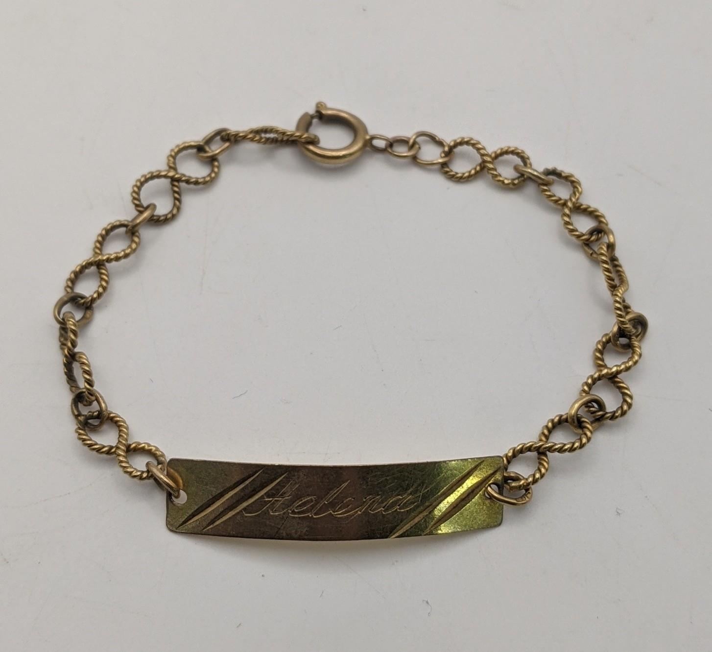 A 9ct gold identity bracelet having the name Helena engraved 19cmL 4.4g Location: