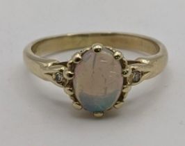 A 9ct gold and opal ring size N½, 2.4 g Location: