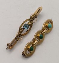 A 15ct gold brooch set with three turquoise stones 5.5g together with a 9ct gold brooch location: