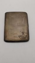 A machine turned cigarette case having an engraved detail to the right corner, hallmarked Birmingham