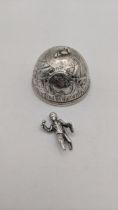 A silver bell having engraved decoration, having a finial fashioned as a boy A/F Location: