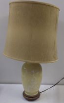 A mid century Chinese famille jaune table lamp decorated with birds and trees, 72.5cmh including