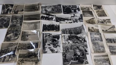 Holocaust related photographs to include thirteen original black and white prints taken shortly