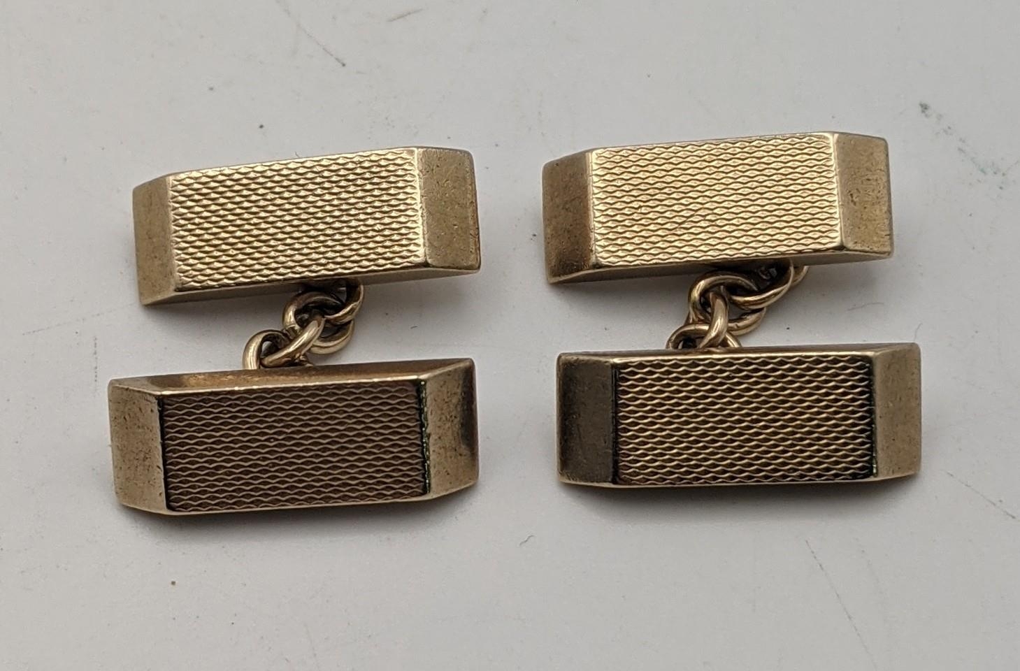 A pair of 9ct gold machine turned cuff links, total weight 17.2g Location: