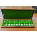 A set of twelve silver Royal Horticultural Society flower tea spoons, total weight 311g Location:
