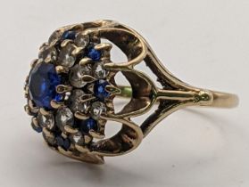 A 9ct gold stepped ring, set with clear and blue stones, 4.1g Location: