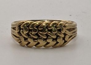 A 18ct gold keeper ring, size P 1/2, weight 4.3g Location: