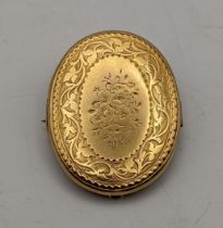 A gold fronted locket converted to a brooch, weight 7.75g Location: