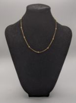 A 9ct gold ball link necklace, 3.9g, 38cm l Location: