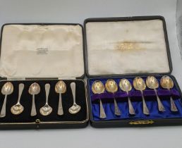 Two sets of silver teaspoons boxed, one set hallmarked Sheffield 1938, total weight 135.7g Location: