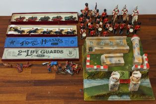 Elastolin model soldiers, some on horseback, a fort and two sets of W Britain 4th Queen's Own
