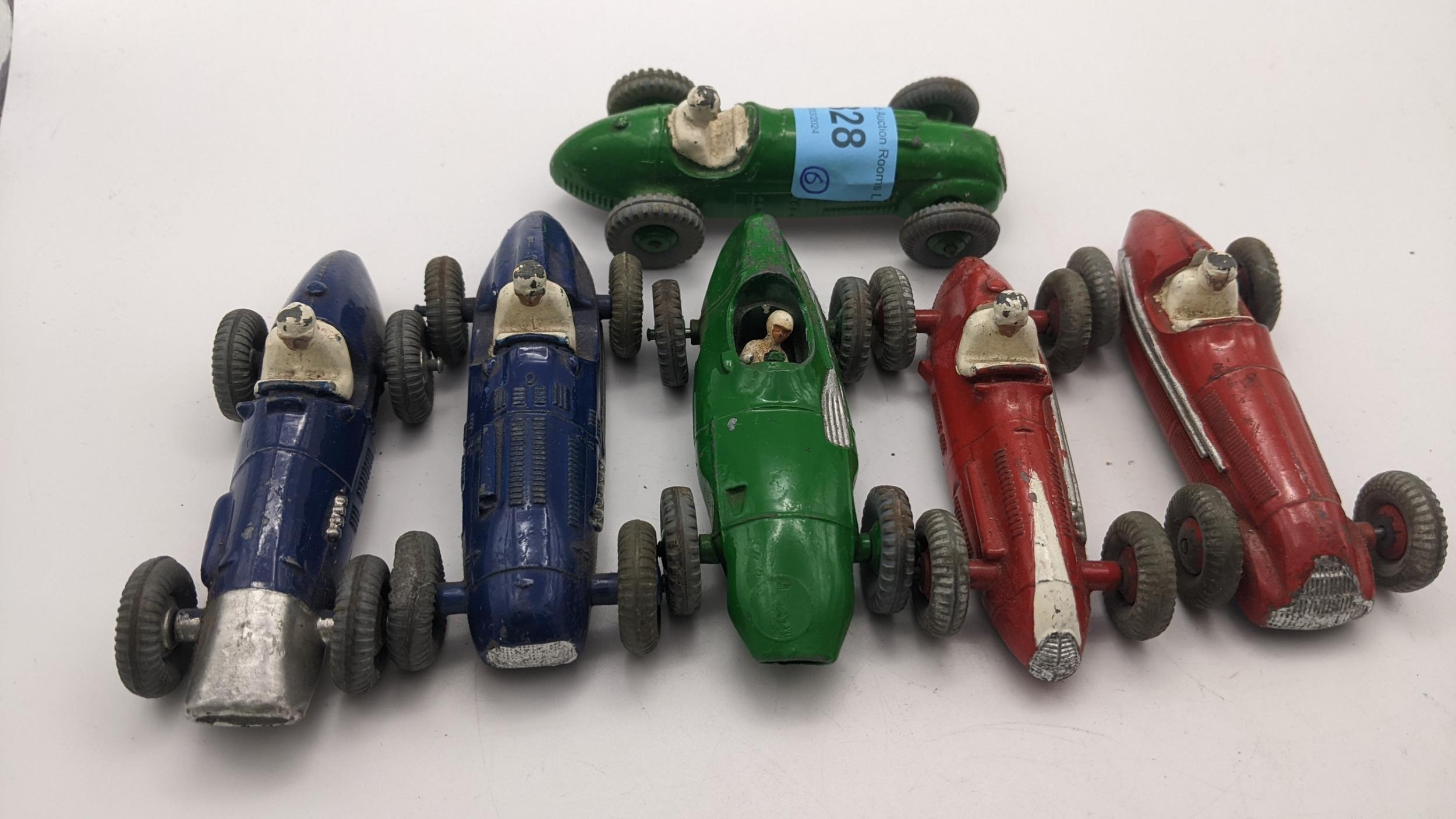 Six Dinky racing cars to include; a blue Ferraris (23H), a red Alfa Rome (23F), a green Vanwell (