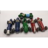 Six Dinky racing cars to include; a blue Ferraris (23H), a red Alfa Rome (23F), a green Vanwell (