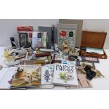A collection of artist related items and books to include box sets of Derwent pencils, sketch pads