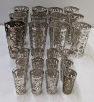 Mexican silver pierced glass holders with drinking glasses, to include eleven tumblers and twelves