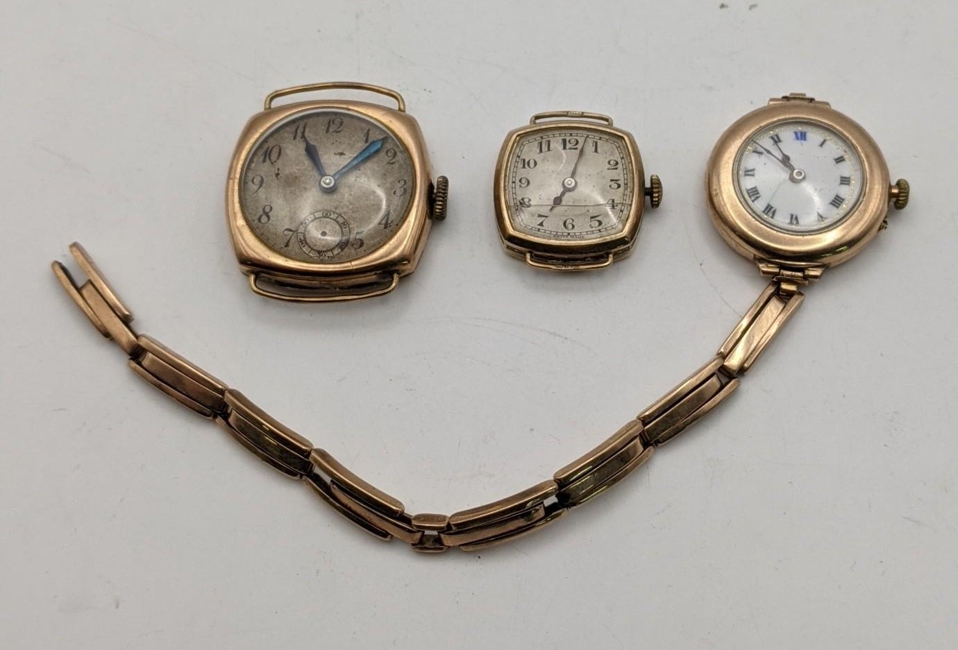 Three 9ct gold cased ladies wristwatches and an expandable strap, total weight 45.2g Location: