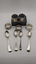 Mixed silver to include three fiddle pattern tea spoons and one other along with a group of napkin