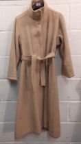 A vintage Wallis beige wool mix ladies swing coat having 2 front pockets, matching belt and buttoned