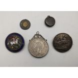 Mixed coins to include a George III garter crown A/F, enamelled and brooched, a 1821 crown converted