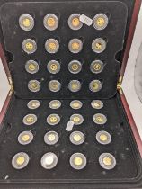 The Worlds Finest Gold Miniatures - A cased set of 32 24ct Gold miniature coins to include, 2009