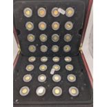 The Worlds Finest Gold Miniatures - A cased set of 32 24ct Gold miniature coins to include, 2009